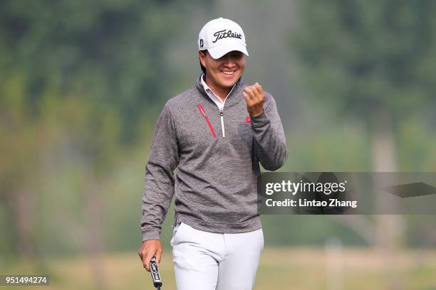 Jin Daxing reacts after the plays a shot during the first round of the 2018 Volvo China Open at Topwin Golf and Country Club on April 26, 2018 in...