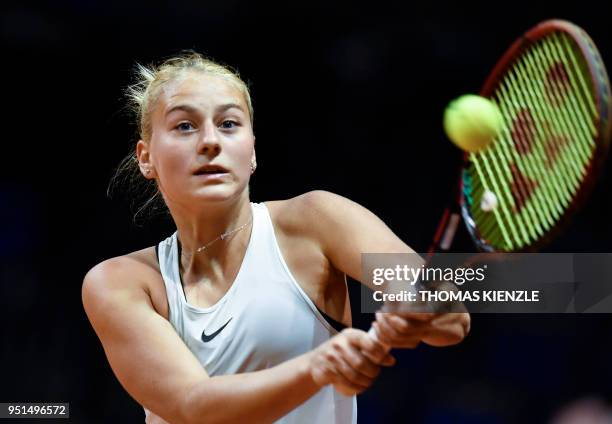 Ukraine's Marta Kostyuk returns the ball to France's Caroline Garcia during the WTA Porsche Tennis Grand Prix in Stuttgart, southwestern Germany, on...