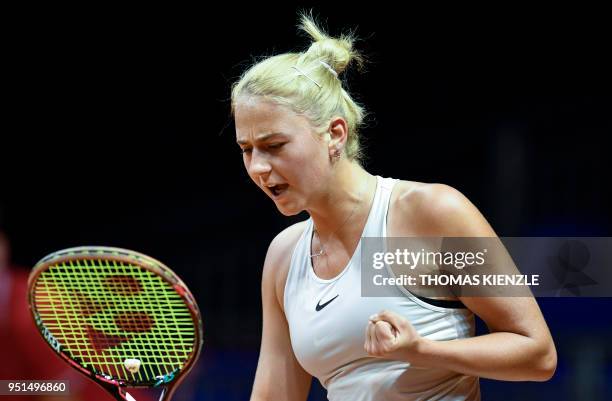 Ukraine's Marta Kostyuk reacts during her match against France's Caroline Garcia during the WTA Porsche Tennis Grand Prix in Stuttgart, southwestern...