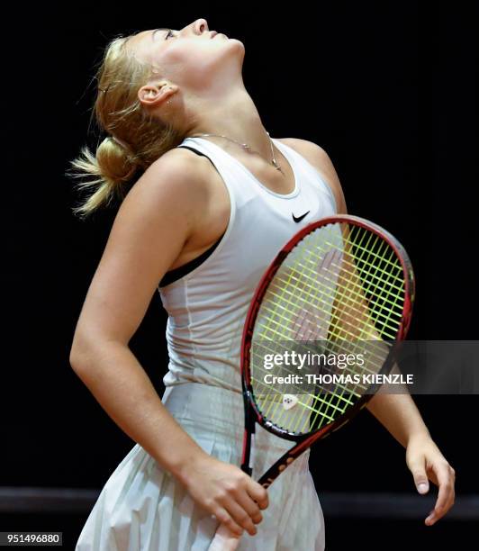 Ukraine's Marta Kostyuk reacts during her match against France's Caroline Garcia during the WTA Porsche Tennis Grand Prix in Stuttgart, southwestern...