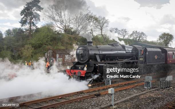 Historic 'Black Five' steam locomotive hauls a ten-carriage train out Yeovil Junction near Yeovil on April 26, 2018 in Somerset, England. A Southern...