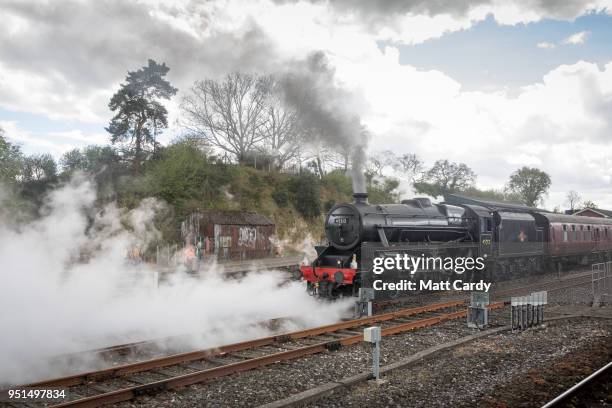 Historic 'Black Five' steam locomotive hauls a ten-carriage train out Yeovil Junction near Yeovil on April 26, 2018 in Somerset, England. A Southern...