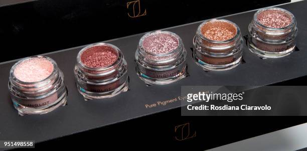 JLOXInglot by Jennifer Lopez pure pigments Eye Shadow in colors Silver Dollar, Ethereal, Celestian, Blazing Rose, Cosmic Glow are displayed at the...