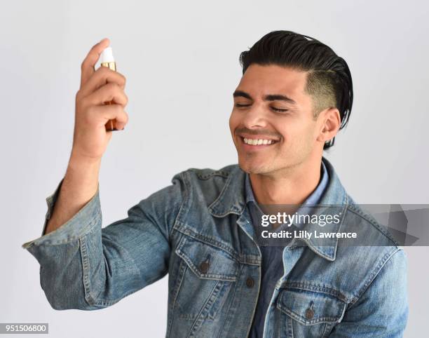 Marlon Aquino using Ormana Skin Care at Visual Snow Initiative visits The Artists Project on April 25, 2018 in Los Angeles, California.