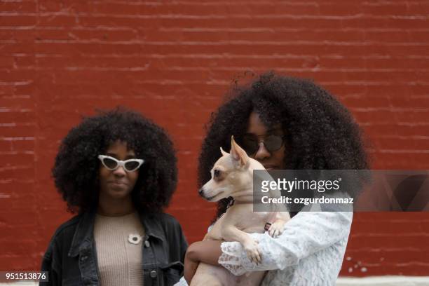 Sisters with their dog, New York