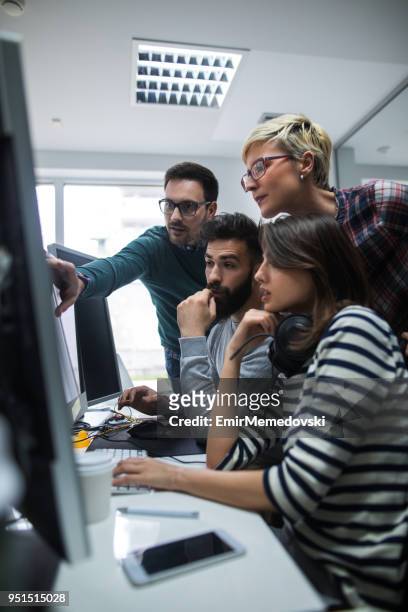 software developers solving a problem - mobile app developer stock pictures, royalty-free photos & images