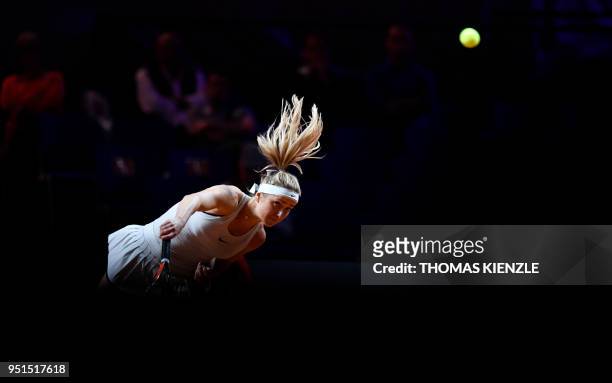 Ukraine's Marta Kostyuk serves the ball to France's Caroline Garcia during the WTA Porsche Tennis Grand Prix in Stuttgart, southwestern Germany, on...