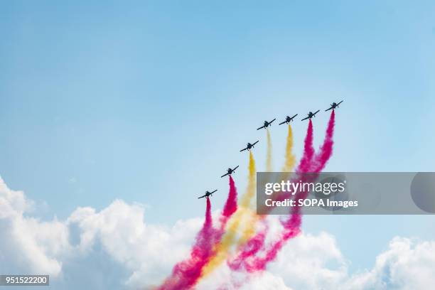 The aerobatic squadron of the Spanish Air Force Patrulla Aguila flies an air show during the first day of the International Air and Space Exhibition...