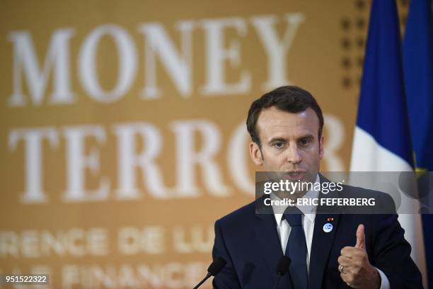 French President Emmanuel Macron gives a speech during the first day of a two-day conference on combating the financing of terror groups on April 26,...