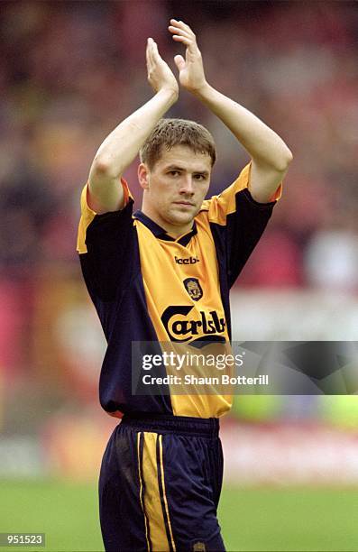 Michael Owen of Liverpool salutes the fans after the FA Carling Premiership match against Charlton Athletic played at The Valley, in London....