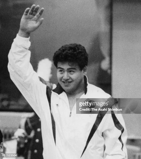 Gold medalist Hideyuki Sekine of Japan celebrates on the podium at the medal ceremony for the Judo Men's open weight during the Beijing Asian Games...