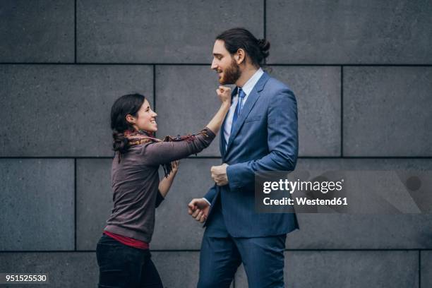 businessman and woman fighting - small man and tall woman stock pictures, royalty-free photos & images