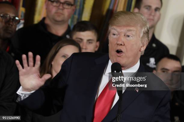 President Donald Trump speaks during an event with the Wounded Warrior Project veterans to kick off the annual Soldier Ride in the East Room of the...