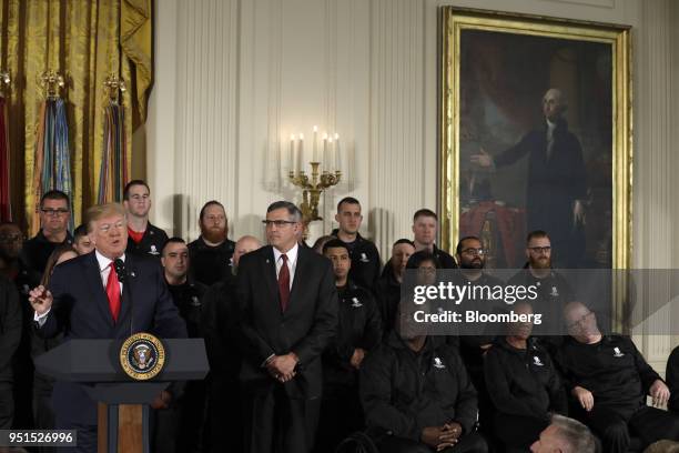 President Donald Trump, left, speaks during an event with the Wounded Warrior Project veterans to kick off the annual Soldier Ride in the East Room...