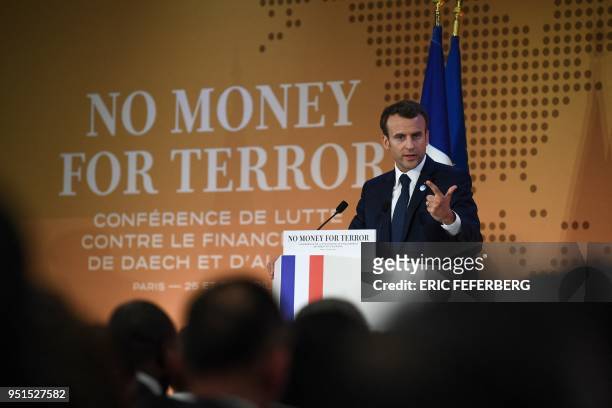 French President Emmanuel Macron gives a speech during the first day of a two-day conference on combating the financing of terror groups on April 26,...