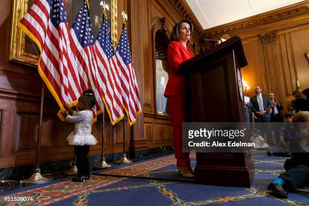 House Minority Leader Nancy Pelosi speaks with journalists' kids during her weekly press conference on 'Take our Daughters and Sons to Work Day' at...