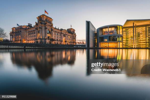 germany, berlin, view to reichstag and paul loebe house at sunset - spree stock-fotos und bilder