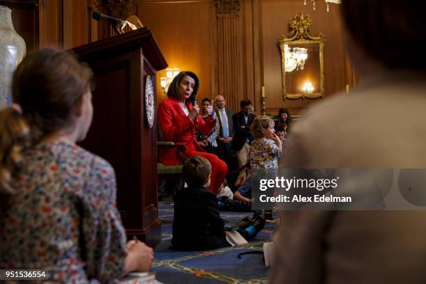 House Minority Leader Nancy Pelosi speaks with journalists' kids during her weekly press conference on 'Take our Daughters and Sons to Work Day' at...