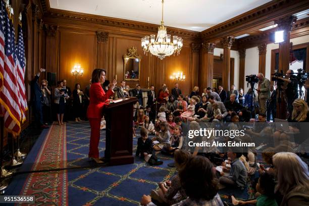 House Minority Leader Nancy Pelosi speaks with journalists' kids during her weekly press conference on 'Take our Daughters and Sons to Work Day' at...