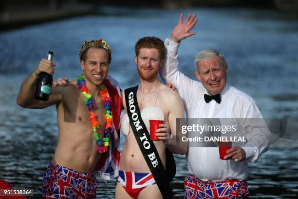 Lookalikes of Britain's Prince William, Duke of Cambridge , Britain's Prince Harry and Britain's Prince Charles, Prince of Wales pose for a picture...