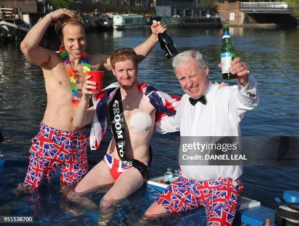 Lookalikes of Britain's Prince William, Duke of Cambridge , Britain's Prince Harry and Britain's Prince Charles, Prince of Wales pose for a picture...