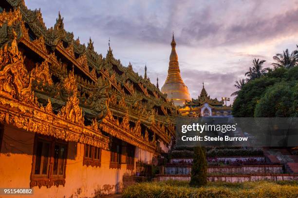 dusk at shwedagon pagoda in yangon, myanmar - shwedagon pagoda stock pictures, royalty-free photos & images