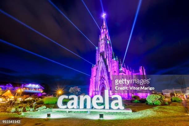 rock cathedral at night with lights on in central canela, rio grande do sul, brazil - canela bildbanksfoton och bilder