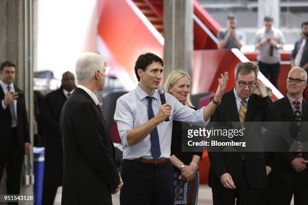 Justin Trudeau, Canada's prime minister, center, speaks during a tour of the Bayview Yards innovation center in Ottawa, Ontario, Canada, on...