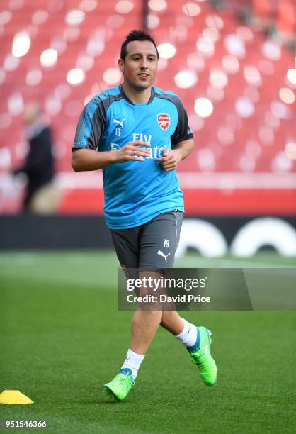 Santi Cazorla of Arsenal trains on the pitch before the UEFA Europa League Semi Final leg one match between Arsenal FC and Atletico Madrid at...