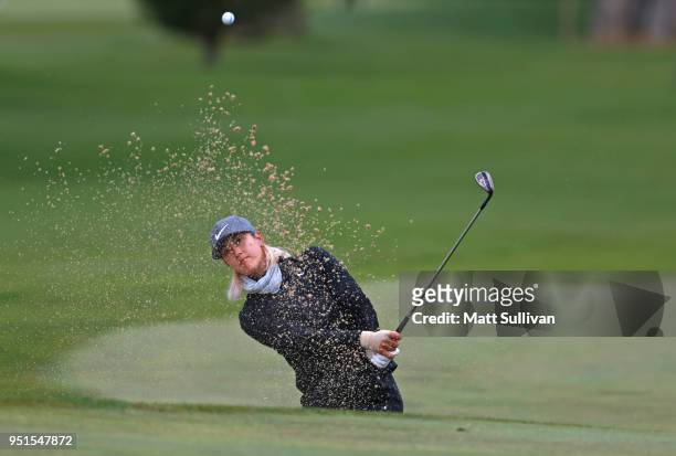 Michelle Wie hits from the sand on the 15th hole during the first round of the Mediheal Championship at Lake Merced Golf Club on April 26, 2018 in...