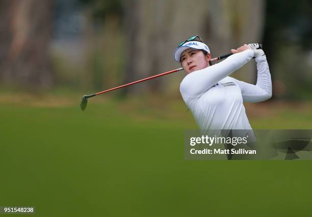 Ji Eun Kim of South Korea watches her second shot on the 15th hole during the first round of the Mediheal Championship at Lake Merced Golf Club on...