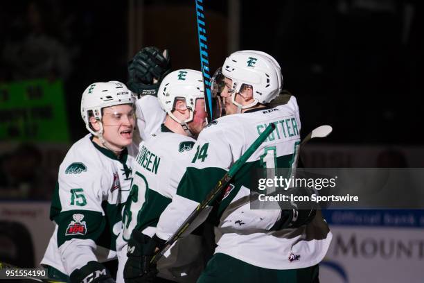 Riley Sutter and Sean Richards of the Everett Silvertips celebrate a Jake Christiansen goal during the second period in Game 5 of the second round of...