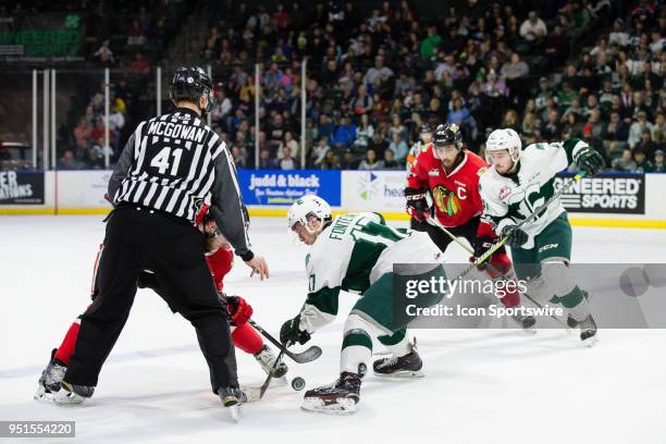 Everett Silvertips captain Matt Fonteyne takes a face-off during the second period in Game 5 of the second round of the Western Hockey League...