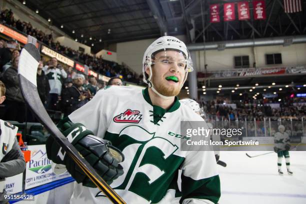 Everett Silvertips forward Ethan O'Rourke celebrates a series win after Game 5 of the second round of the Western Hockey League playoffs between the...