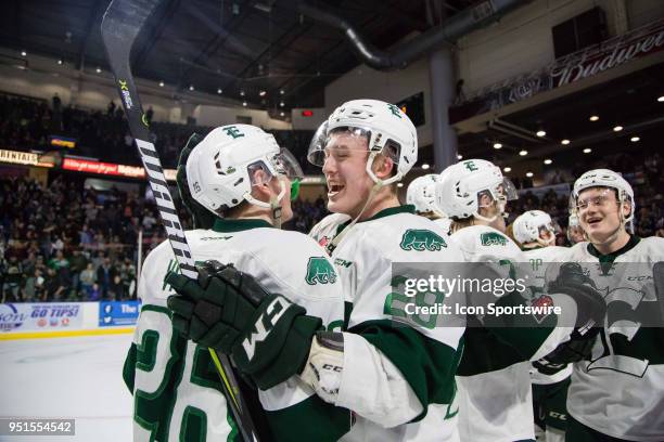 Everett Silvertips Reece Vitelli and Wyatte Wylie celebrate after a victory in Game 5 of the second round of the Western Hockey League playoffs...