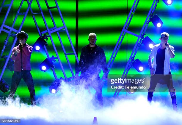 Pictured: Joel Pimintel, Richard Camacho, and Christopher Velez of CNCO perform during rehearsals at the Mandalay Bay Resort and Casino in Las Vegas,...
