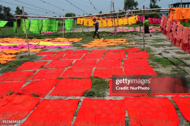 Bangladeshi labors working in the Batik Cloth industry at Narsingdi area near Dhaka, Bangladesh, on April 26, 2018. Each Worker earns par day 400-500...