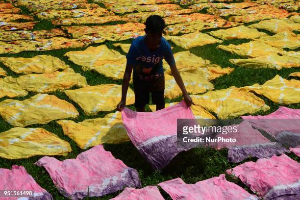 Bangladeshi labors working in the Batik Cloth industry at Narsingdi area near Dhaka, Bangladesh, on April 26, 2018. Each Worker earns par day 400-500...