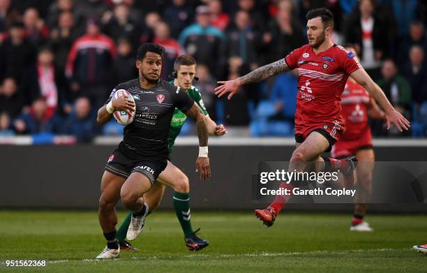 Ben Barba of St Helens gets past Jake Bibby of Salford during the Betfred Super League match between Salford Red Devils and St Helens at AJ Bell...