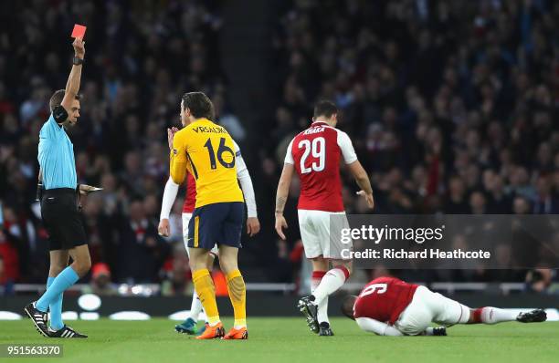 Sime Vrsaljko of Atletico Madrid is shown a red card during the UEFA Europa League Semi Final leg one match between Arsenal FC and Atletico Madrid at...