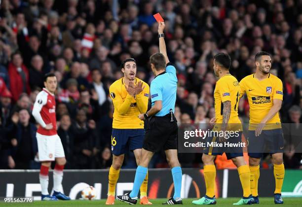 Sime Vrsaljko of Atletico Madrid is shown a red card during the UEFA Europa League Semi Final leg one match between Arsenal FC and Atletico Madrid at...