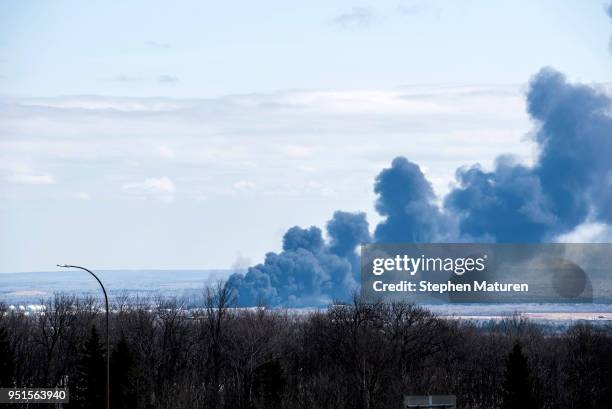 View of the fire at Husky Oil Refinery in Superior, Wisconsin on April 26, 2018 seen from Duluth, Minnesota. At least 11 people were injured when a...