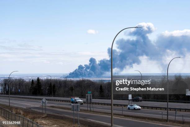 View of the fire at Husky Oil Refinery in Superior, Wisconsin on April 26, 2018 seen from Duluth, Minnesota. At least 11 people were injured when a...