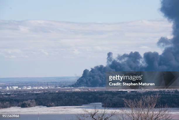View of the fire at Husky Oil Refinery in Superior, Wisconsin on April 26, 2018 seen from Duluth, Minnesota. At least 11 people were injured when a...