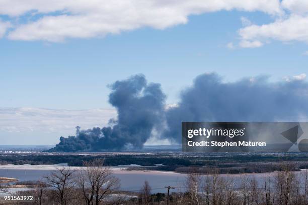 View of the fire at Husky Oil Refinery in Superior, Wisconsin on April 26, 2018 seen from Duluth, Minnesota. At least 11 people were injured when a...