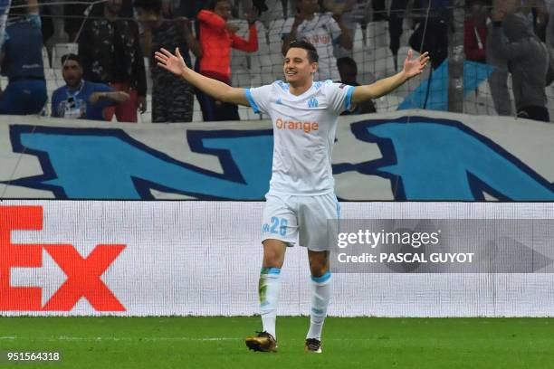 Marseille's French midfielder Florian Thauvin celebrates after scoring a goal during the UEFA Europa League first-leg semi-final football match...