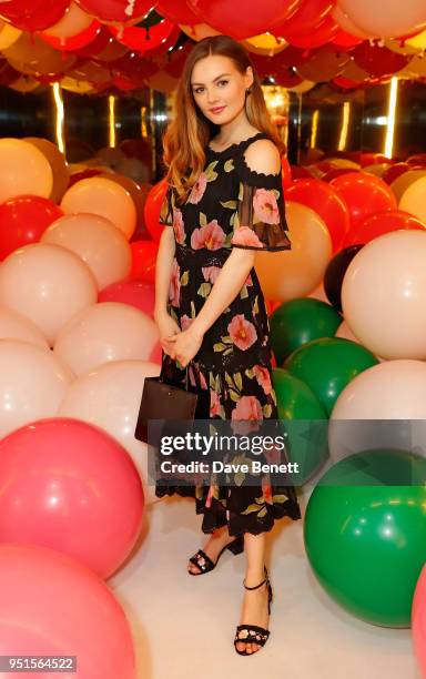 Niomi Smart attends the kate spade new york pop-up party on April 26, 2018 in London, England.