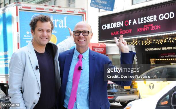 Actor Joshua Jackson and moderator Richard Ridge point to the marquee for the play 'Children of a Lesser God' as he attends SAG-AFTRA Foundation...