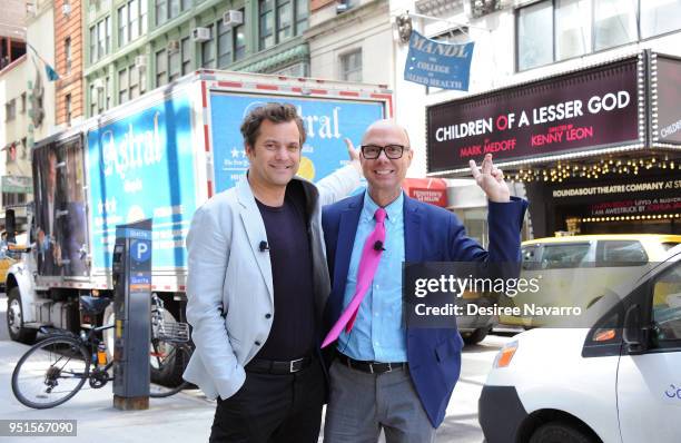 Actor Joshua Jackson and moderator Richard Ridge point to the marquee for the play 'Children of a Lesser God' as he attends SAG-AFTRA Foundation...