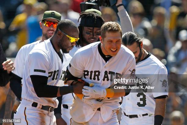 Corey Dickerson of the Pittsburgh Pirates celebrates after hitting a walk off home run in the ninth inning against the Detroit Tigers during...